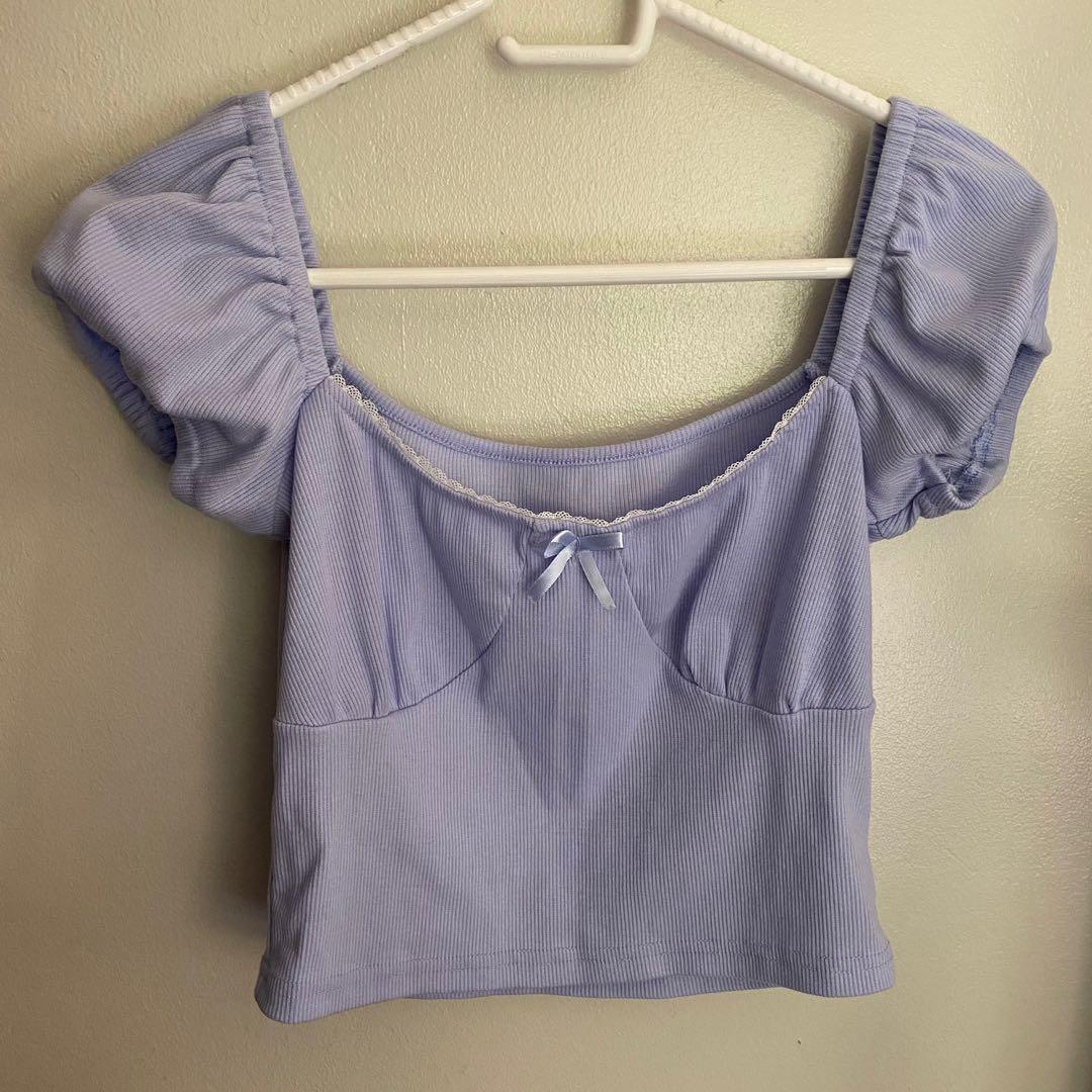 Purple Crop Top with puffed sleeves (Category: Longsleeves) located in Pasig City. Submitted by pheebriez (Listing ID 1064225625, Image 1). Description: Bought this top on shopee for 250 pesos Rfs: Too Small.