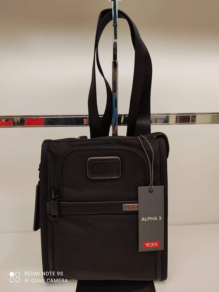 tumi small pocket bag