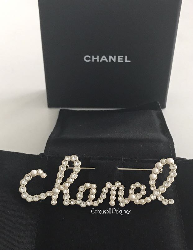 Chanel script deals brooch