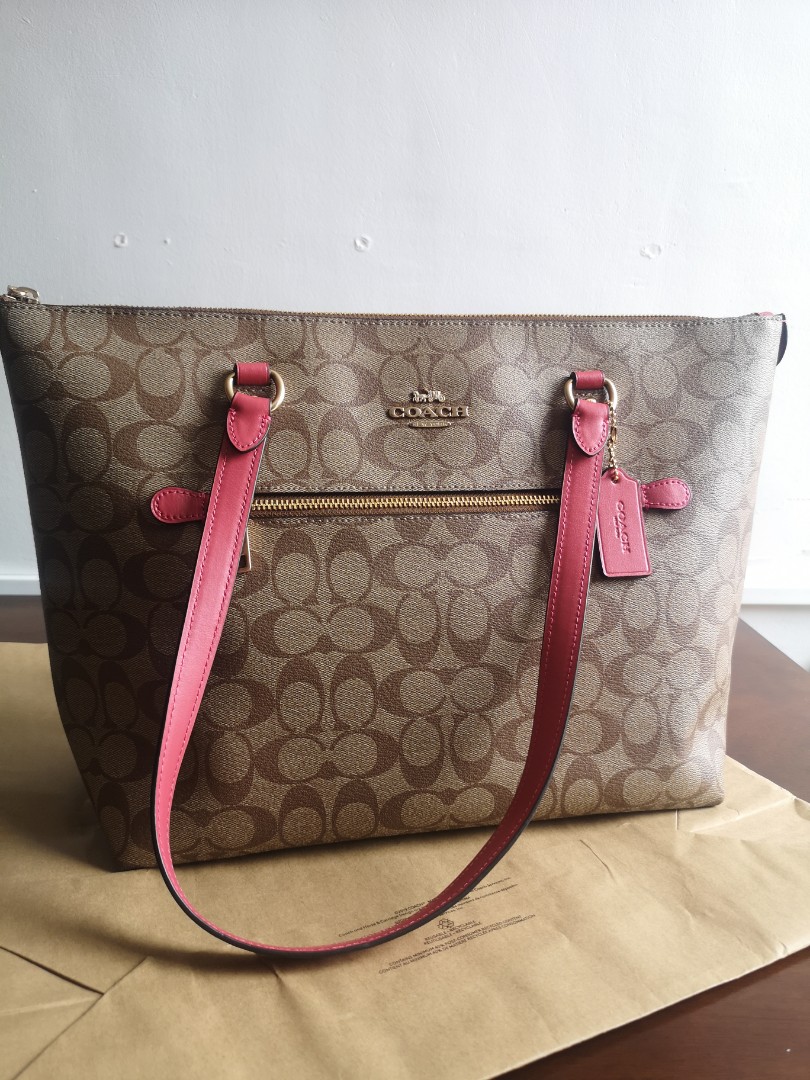 Coach purse with pink handles top