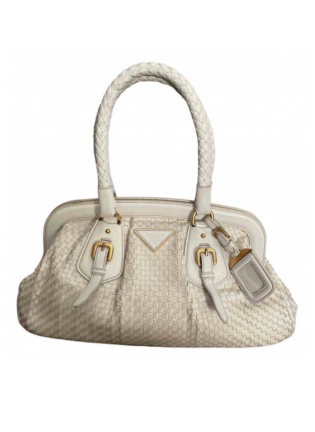GENUINE PRADA HAND BAG IN WOVEN & BRAIDED IVORY LEATHER (Category: Bags & Wallets) located in Melbourne. Submitted by jayy. (Listing ID 1064637366, Image 1). Description: GREAT CONDITION, purchased from Paris. Width - 37cm Height- 23cm Depth- 12cm.