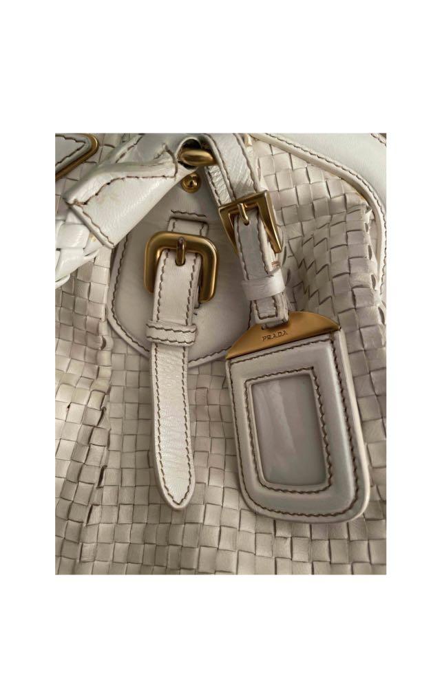 GENUINE PRADA HAND BAG IN WOVEN & BRAIDED IVORY LEATHER (Category: Bags & Wallets) located in Melbourne. Submitted by jayy. (Listing ID 1064637366, Image 3). Description: GREAT CONDITION, purchased from Paris. Width - 37cm Height- 23cm Depth- 12cm.