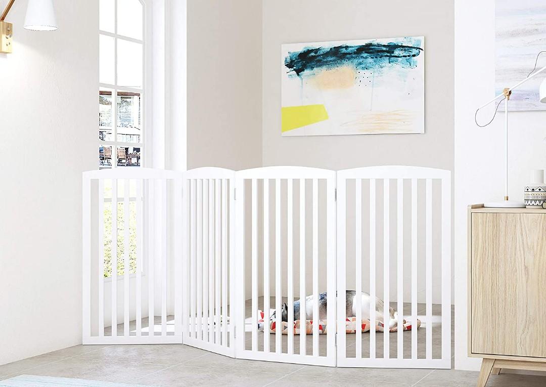 white freestanding dog gate