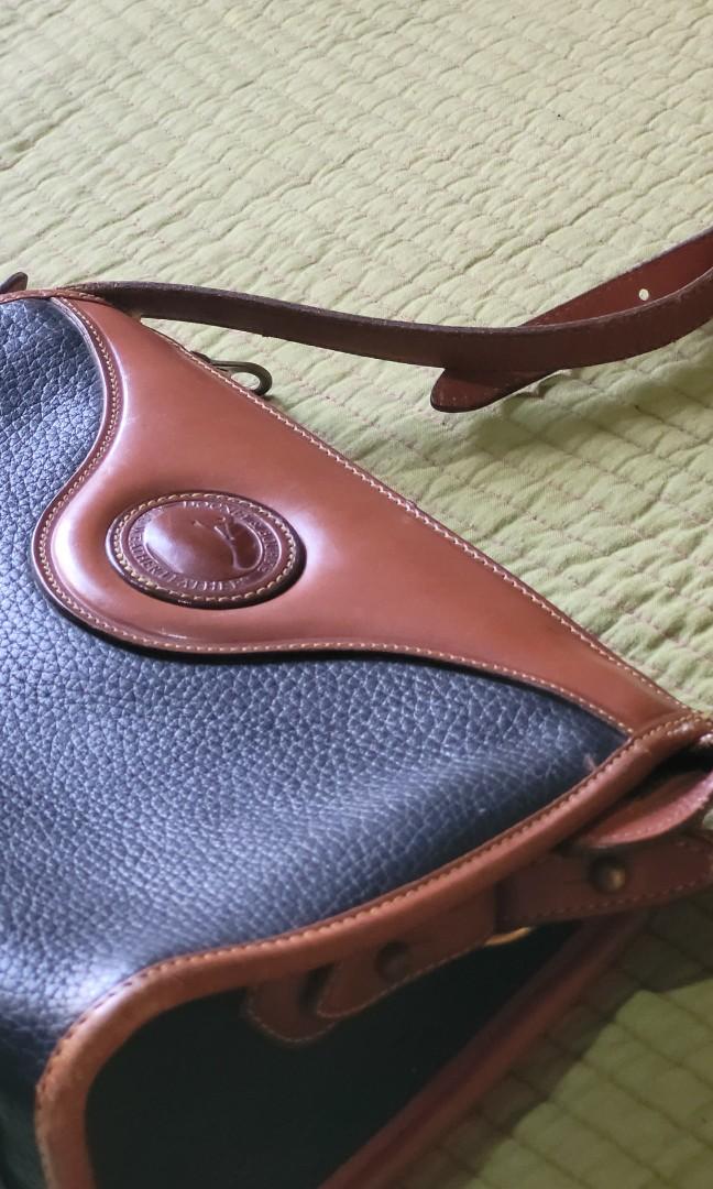 Dooney and bourke black and tan hotsell leather purse