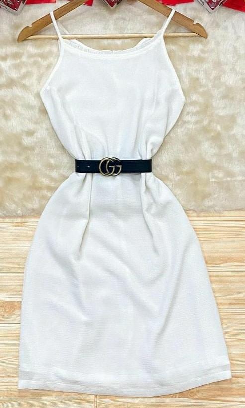 Plain white straight dress (Category: Dresses) located in Muntinlupa City. Submitted by elle_declutter (Listing ID 1064426041, Image 1). Description: Click on the photo to see the whole dress. The dress includes a lining. Worn only once. RFS: I don't like the fit on me. P.S. Photo was taken from the store where I bought the dress. Belt not included..