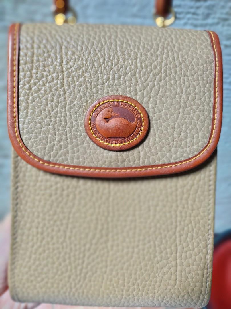 Dooney and bourke store all weather leather wallet