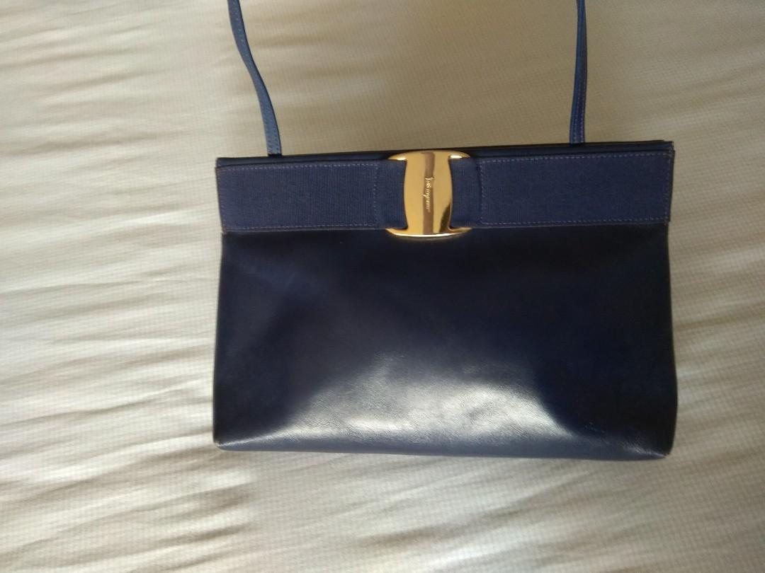 Ferragamo Cross Body/Clutch Bag (Category: Luxury Bags & Wallets) located in San Juan City. Submitted by gawed (Listing ID 1064644708, Image 1). Description: Pre-Loved Authentic Vintage Ferragamo Cross Body Bag convertible to Clutch Bag. Genuine Leather Navy Blue, in good condition with normal wear and tear as picture shown. Brass Labels are polished and clean. Great bag to bring to use in formal or informal use. Versatile. Price is negotiable. R