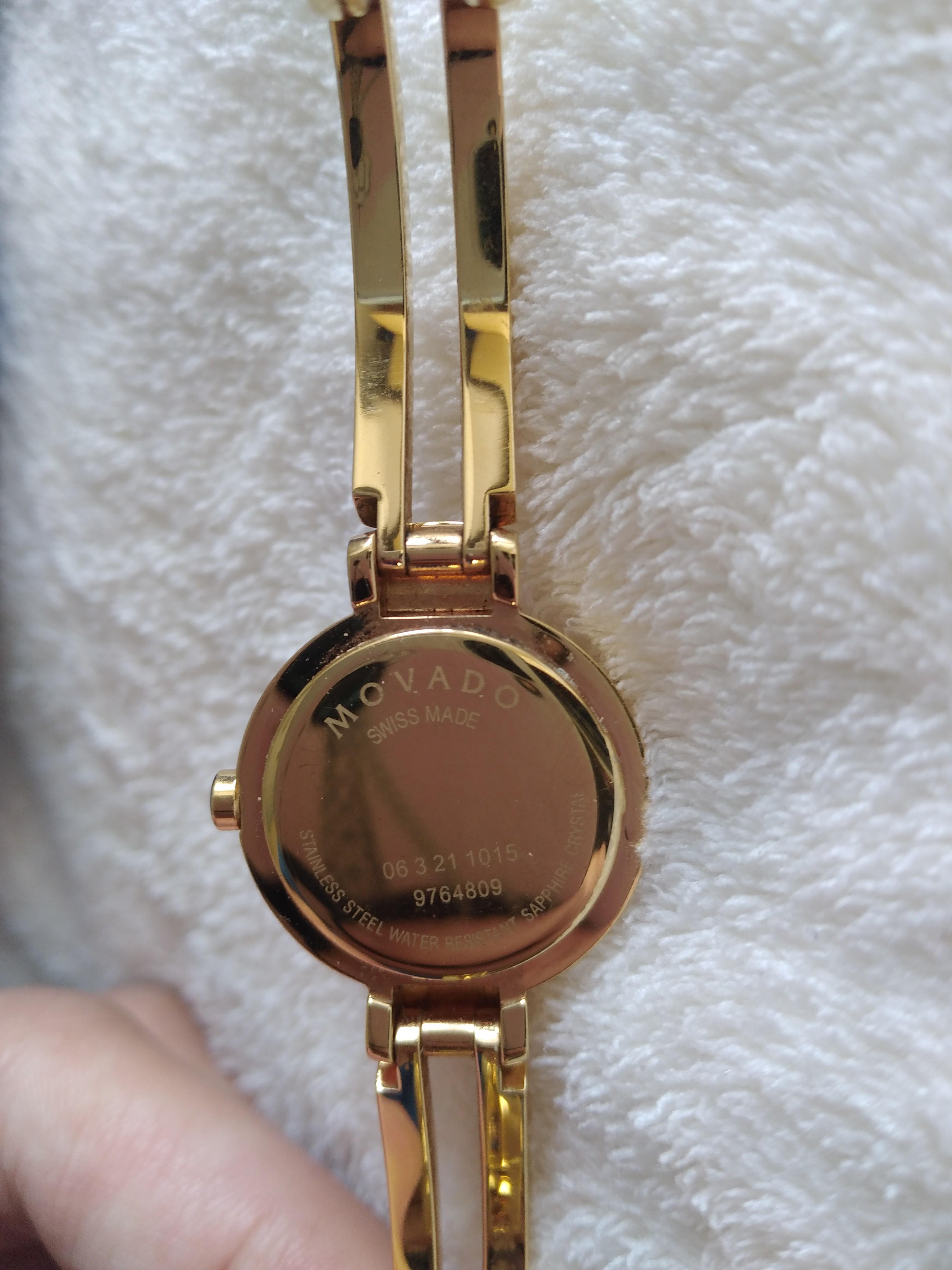 Movado swiss made stainless clearance steel water resistant sapphire crystal