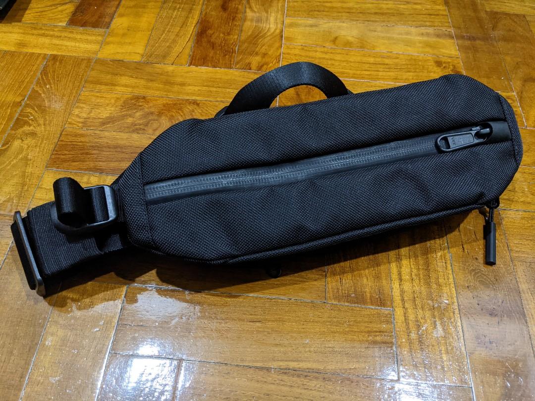Cobra buckle sling bag store