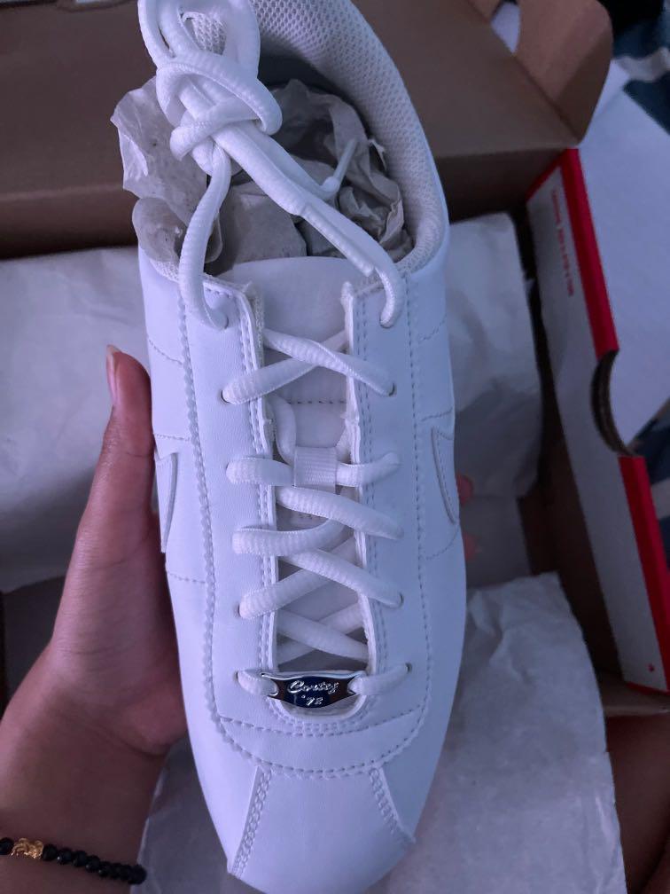 all white cortez womens