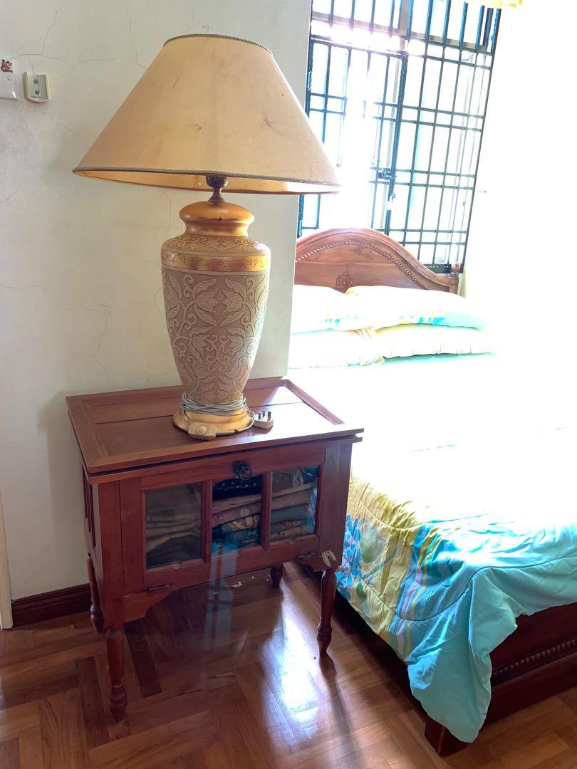 Bedside Table (Category: Tables & Sets) located in Selayang. Submitted by faidmuzahid (Listing ID 1064908674, Image 1). Description: Item as shown in the picture. Teak wood. One pcs glass was broken and can be replace at any glass shop. Self pick up at taman impian emas Johor Bahru .