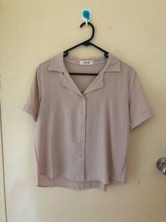 Beige button down shirt