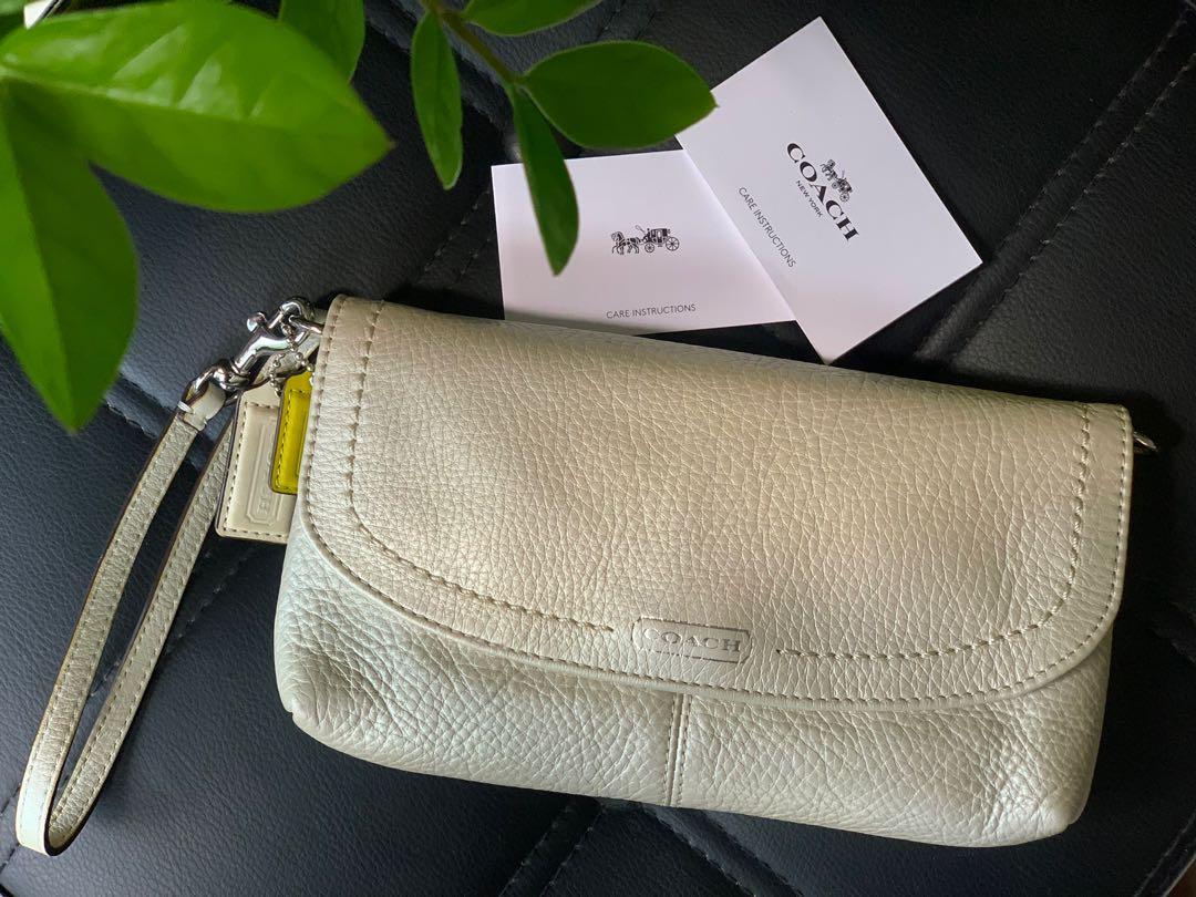 white wristlet clutch bag