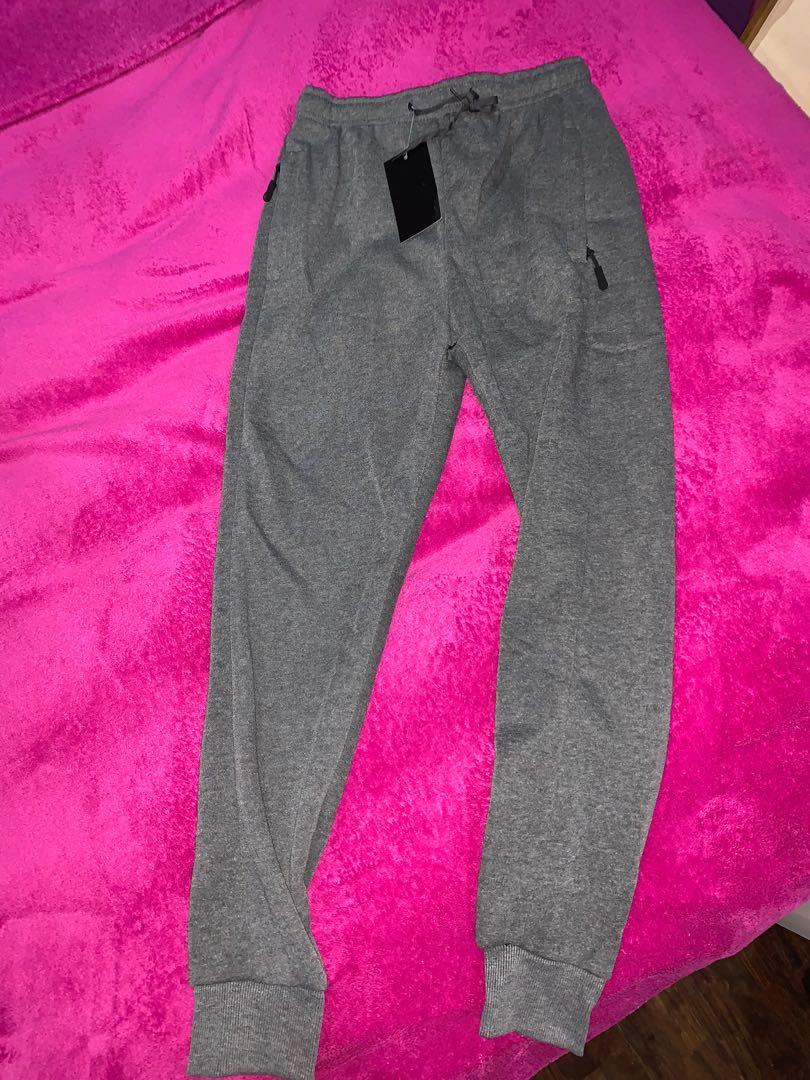 Dark Grey Sweatpants (NEW) (Category: Other Bottoms) located in Pasig City. Submitted by ysabeldc (Listing ID 1065002708, Image 1). Description: Brand new good quality unisex sweatpants ❣️ RFS: Bought for my boyfriend, too small on him. *Says XL on tag but fits small frames only. See pic for reference (I’m 5’4).