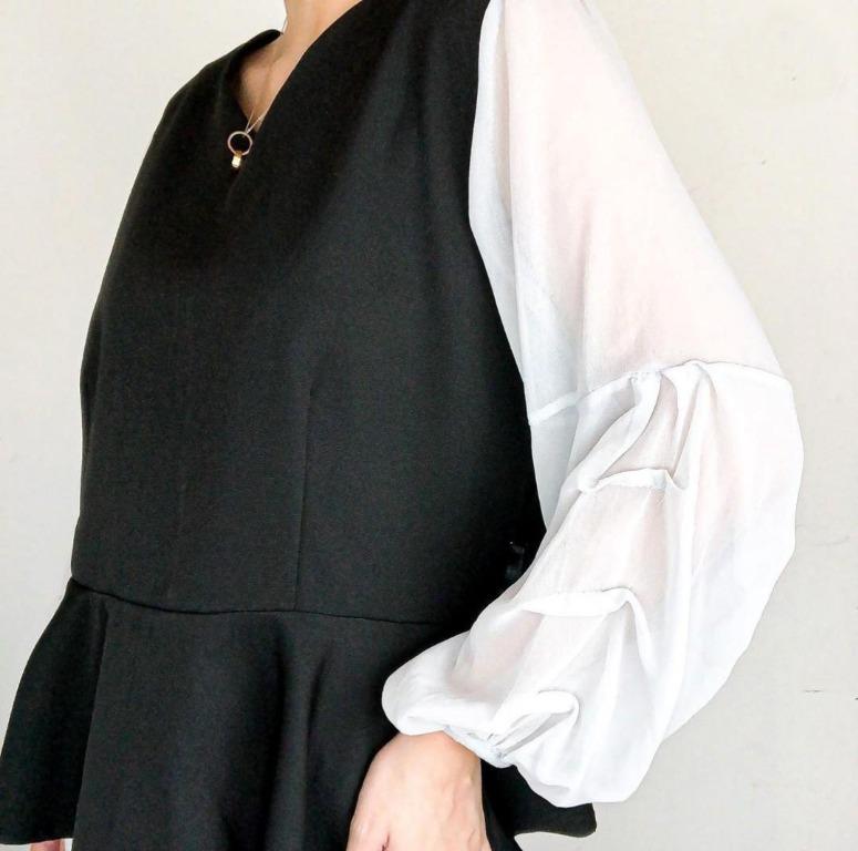 Black and White Peplum Top (Category: Blouses) located in Quezon City. Submitted by ruth113 (Listing ID 1064879010, Image 3). Description: Black and white peplum top.