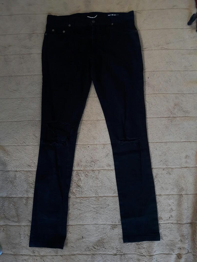 Saint Laurent Paris Tattered Jeans (Category: Jeans) located in Baguio. Submitted by damnmitri (Listing ID 1065051889, Image 1). Description: Saint Laurent Paris Tattered Jeans Condition: 8/10 Size: 34W x 39L Issue: Slight Fading , Needs wash.