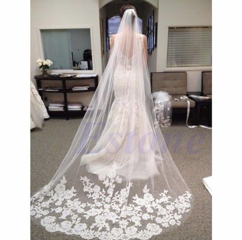 Bride with long veil clearance