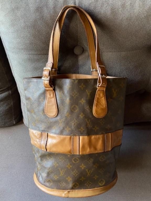 Louis vuitton french company bucket bag store