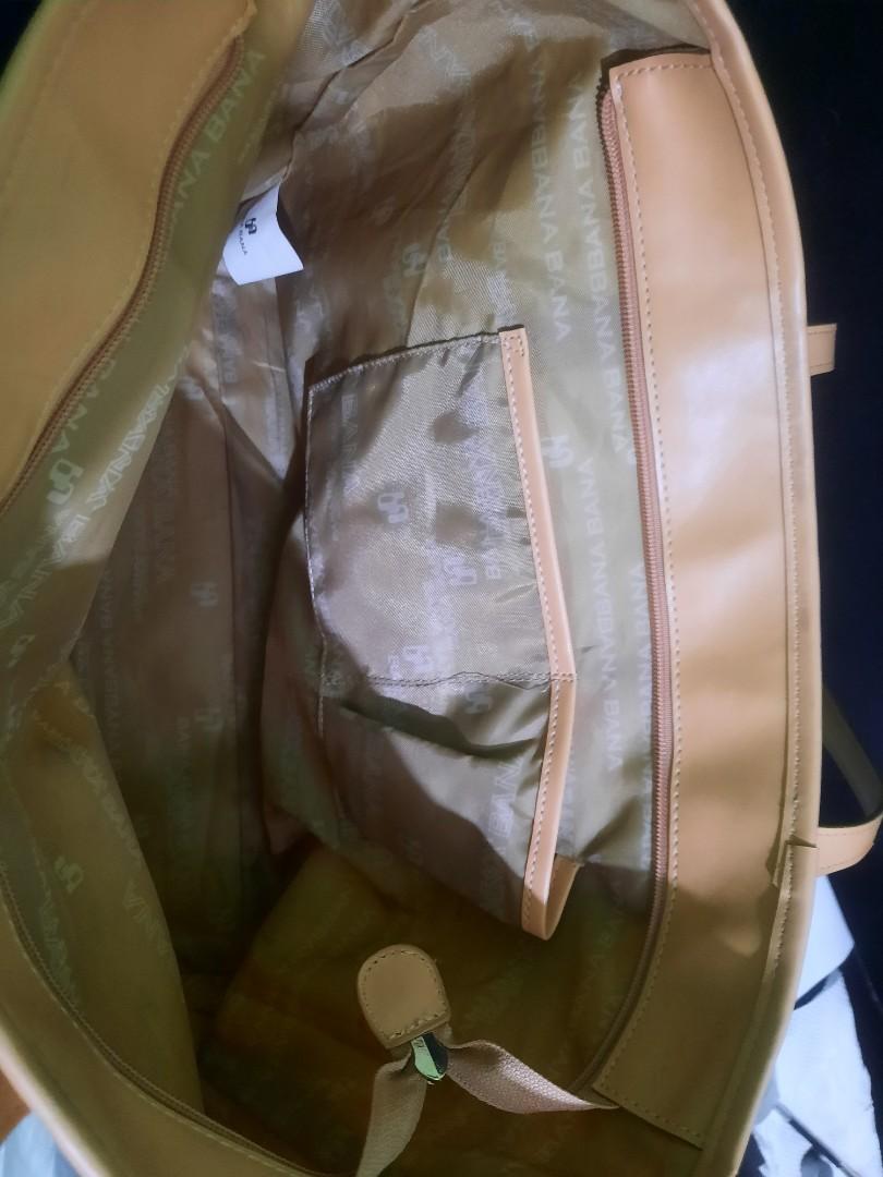 Tote Bag -Bana Bana (Category: Tote Bags) located in Bulacan. Submitted by juliebeh (Listing ID 1065319531, Image 2). Description: *medium tote lightweight material zipper closure color- beige nylon with leather handle 2 open pockets inside with signs of use clean inside Preloved items po but well cared for. Yung iba binili ko sa store, others online, some are gifts. Payment via Gcash or BDO. Feel free to ask for more info on the item if interest