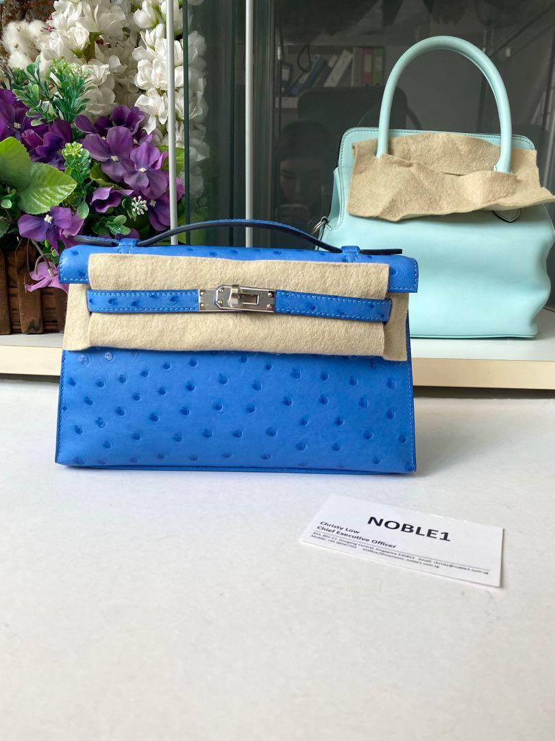 New colour. WA Flo 65 90683848. New Bleuet Ostrich Sellier Kelly Pochette  Ghw. C stamp full set with original receipt. Virtual inventory available  with deposit.…