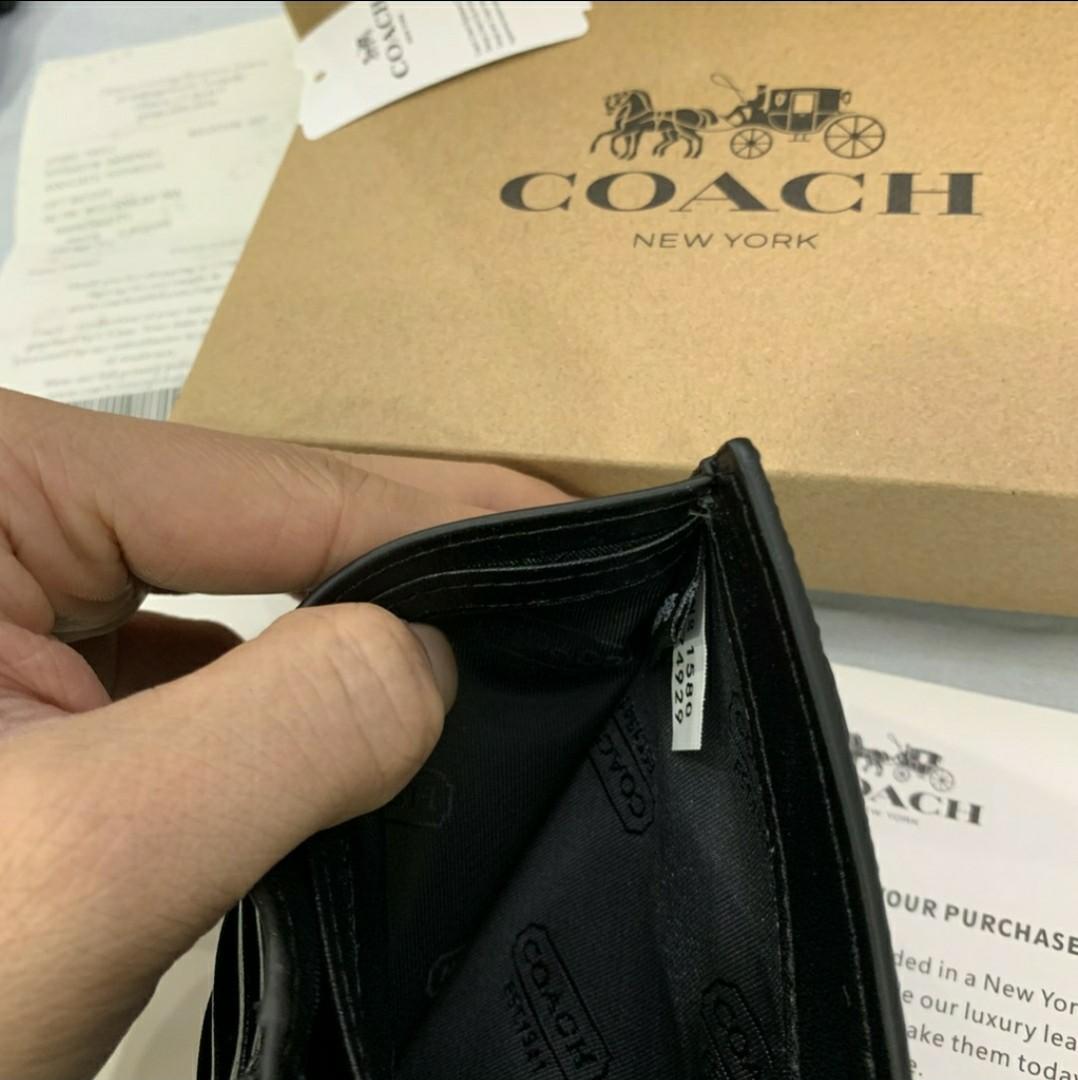Coach Men's wallet has serial number 
