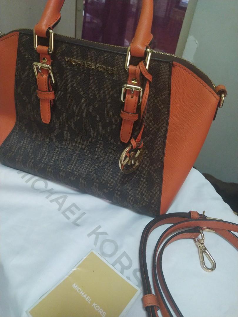 Michael Kors Tangerine Ciara two way bag (Category: Cross-body Bags) located in Quezon City. Submitted by declutteringempress (Listing ID 1065152376, Image 2). Description: 💯 authentic 📌US bought 📌signs of usage in hardwares 📌vuc 📌LP POSTED 📌first photo used as reference only #bye2020.