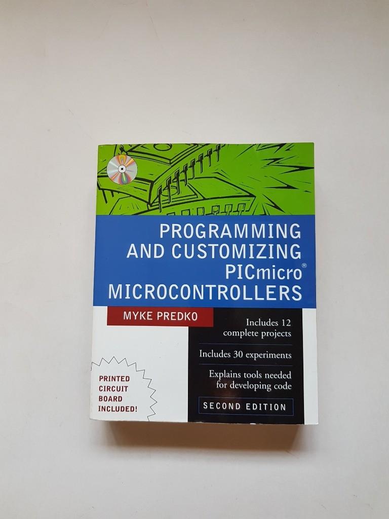 PROGRAMMING AND CUSTOMIZING PICmicro MICROCONTROLLERS (Category: Storybooks) located in Singapore. Submitted by serendipity8888 (Listing ID 1065289899, Image 1). Description: - Authors: Myke Predko - Publisher: McGraw-Hill - 2nd Edition - 1190 Pages - Condition: 9.5/10 - NO markings - NO torn pages - Tags: Electronics.