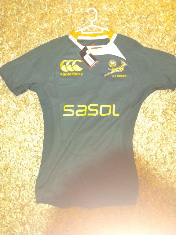 2005 Springboks Rugby Jersey (Supporter's Version). Sasol Sponsor on the front has faded. Missing a single button. Size XL R500