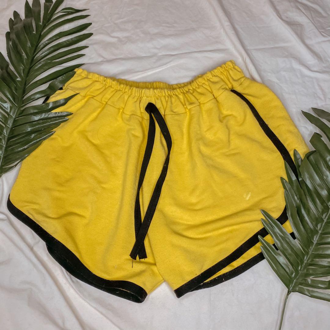 Yellow dolphin shorts top