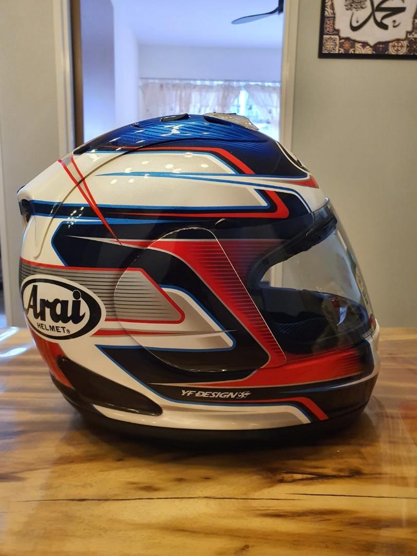 Arai Helmet (Category: Motorcycle Apparel) located in Singapore. Submitted by openthrottle (Listing ID 1065480445, Image 2). Description: Letting go full face RX7 Pedrosa. 4 times used Slight stone chips at the front $600 Size:M (Selling on behalf of someone).