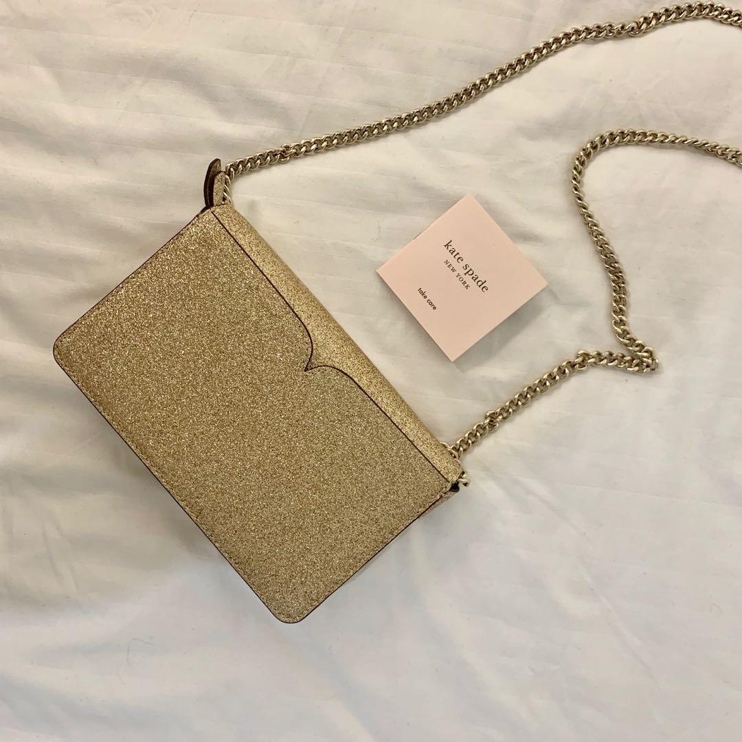 Kate Spade nicola shimmer twistlock chain wallet (Gold), Women's Fashion,  Bags & Wallets, Cross-body Bags on Carousell