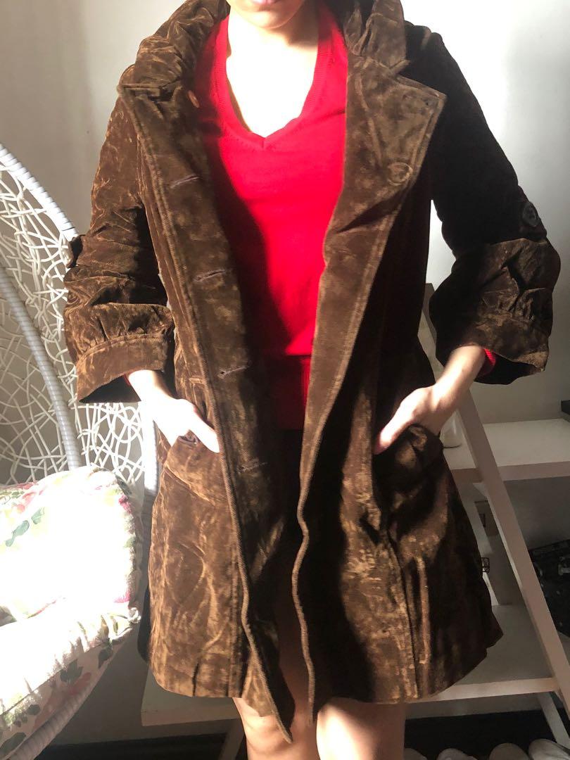 Brown Coat (Category: Coats, Jackets and Outerwear) located in Quezon City. Submitted by maydeclutters (Listing ID 1065423322, Image 2). Description: Semi-suede cloth Chocolate brown color No flaw Fits small to medium Items are preloved, please manage your expectations.