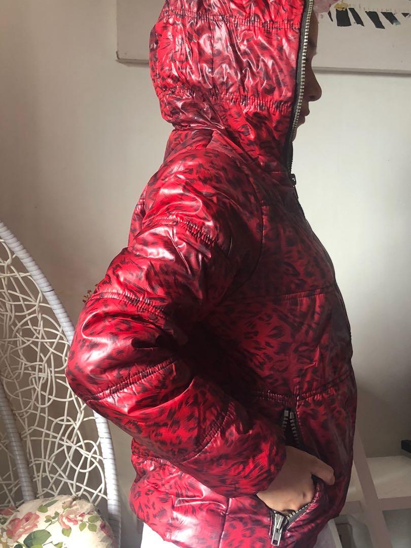 Puff/Winter Jacket (Category: Coats, Jackets and Outerwear) located in Quezon City. Submitted by maydeclutters (Listing ID 1065426840, Image 3). Description: Red color Animal print design Super nice! Fits up to large frames.