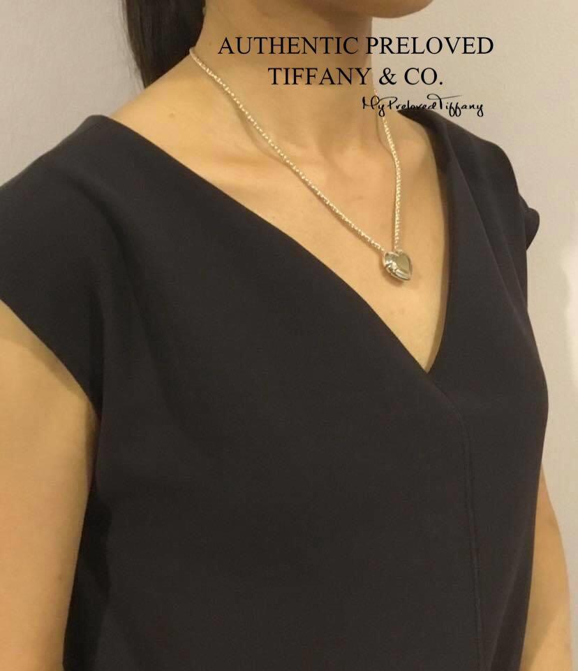 Puzzle piece 2024 necklace tiffany
