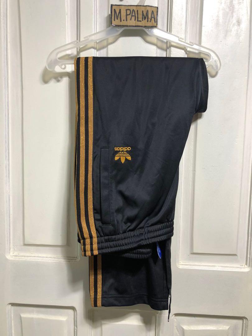 adidas track pants gold
