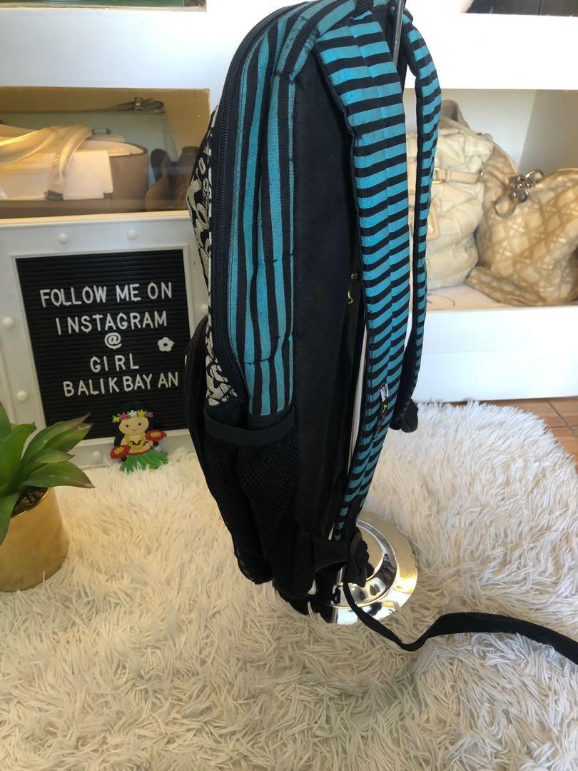 Backpack SALE‼️ Guaranteed authentic ROXY (Category: Backpacks) located in Marikina City. Submitted by girlbalikbayan (Listing ID 1065696540, Image 2). Description: We’re clearing out our shelves and selling our preloved backpacks and other bags CHEAP! Like this item - 🔘100% authentic ROXY 🔘Cool graphic design 🔘Colors of blue, black and white for the ROXY name and logo 🔘Padded shoulder straps for comfort 🔘And back is fully padded too 🔘Front