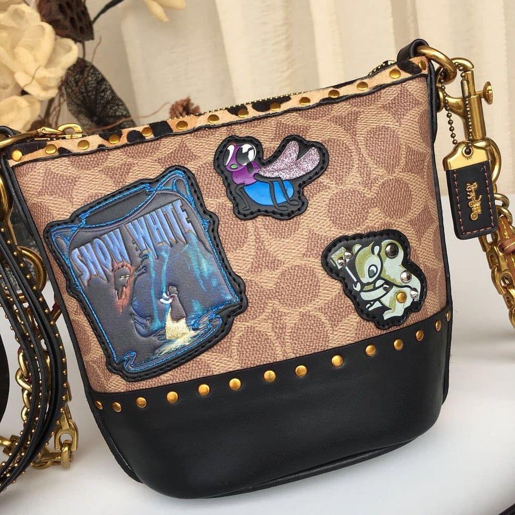 Coach disney duffle 12 sales