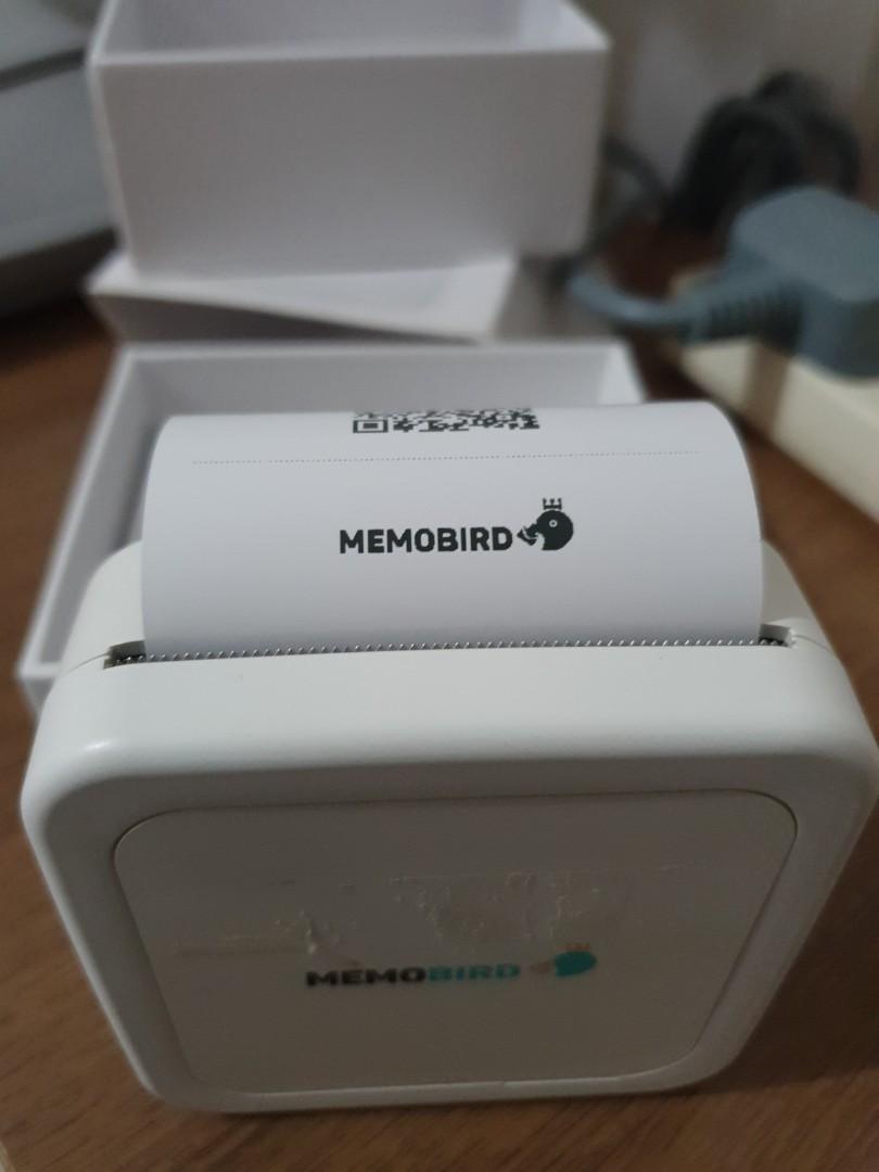 Mini printer (Category: Printers, Scanners & Copiers) located in Singapore. Submitted by eejing2000 (Listing ID 1065757104, Image 2). Description: selling cheap as use less than 5 times palm size...print black n white only can be connected to app for more features -memobird.