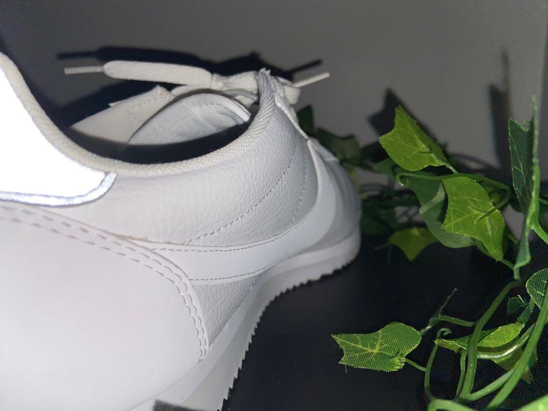 Plain white nike cortez deals