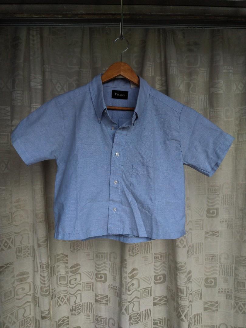 **Blue Collared Crop Top (Category: Sleeveless) located in Kuala Lumpur. Submitted by nicosue (Listing ID 1065887174, Image 1). Description: Condition: 7/10 Size: Free size, loose fit Colour: Light blue Material: 60% cotton, 40% polyester (slightly thick) Measurements when laid flat: Bust: 48cm Length: 52cm • Price is excluding postage..