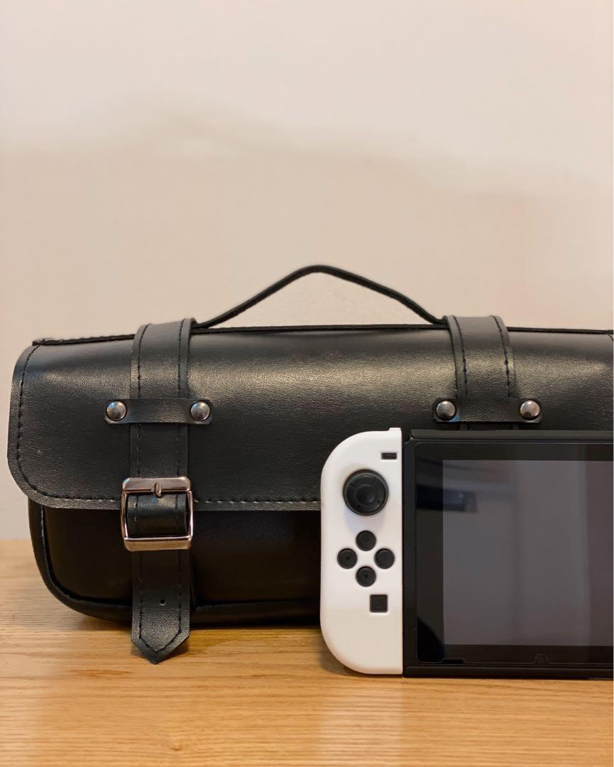 Custom Nintendo Switch Leather Bag (Category: Cases & Covers) located in Mandaluyong City. Submitted by kfrancisco08 (Listing ID 1065920919, Image 2). Description: Custom Leather Bag made from kidskin leather, Perfect fit for Nintendo Switch. Comes with Shoulder Strap Detachable divider inside Can do meet ups (Mandaluyong/BGC area) or delivery via your preferred courier .