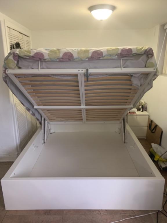 Ikea malm pull on sale up storage bed