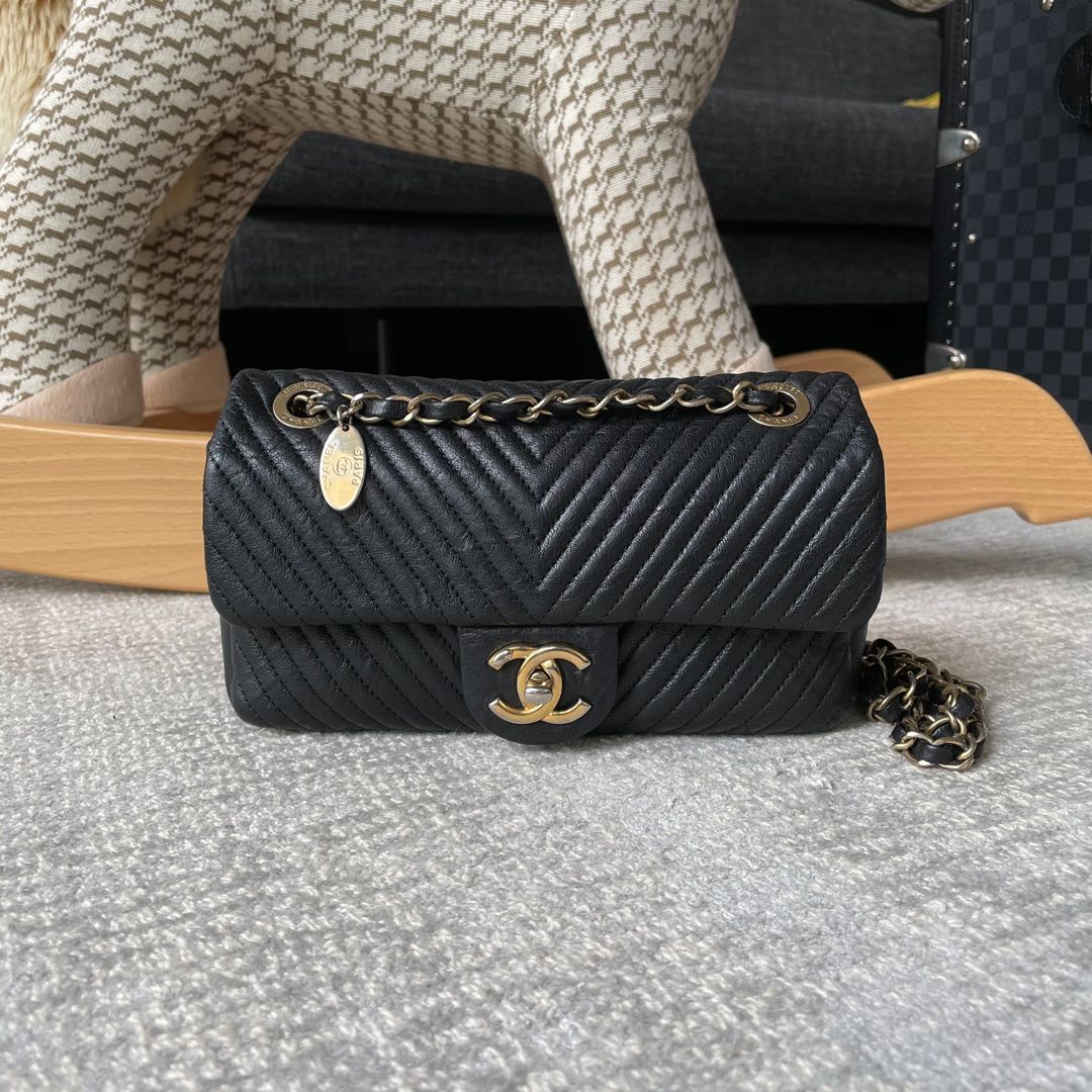 Chanel Surpique Chevron Flap, Luxury, Bags & Wallets on Carousell