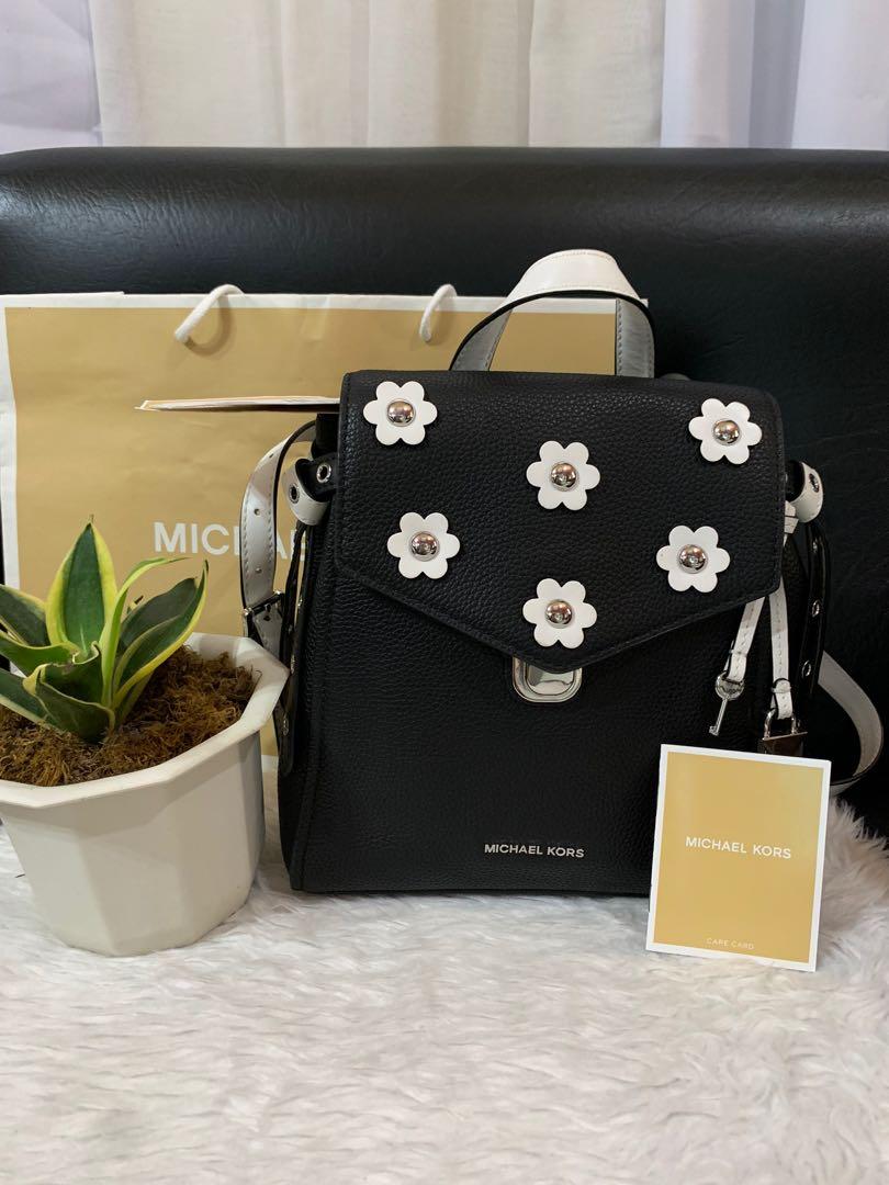 Michael Kors Bristol with flower appliqués Backpack, Luxury, Bags & Wallets  on Carousell