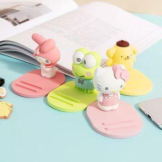 Sanrio Pompompurin Hello Kitty My Melody Keroppi Cinnamoroll Kuromi Charlie Brown Snoopy Despicable Me Minion Toy Story Three Eyed Alien Doraemon Figurines Handphone Mobile Stand Holder