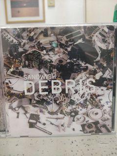 Sandwich CD Debris opm