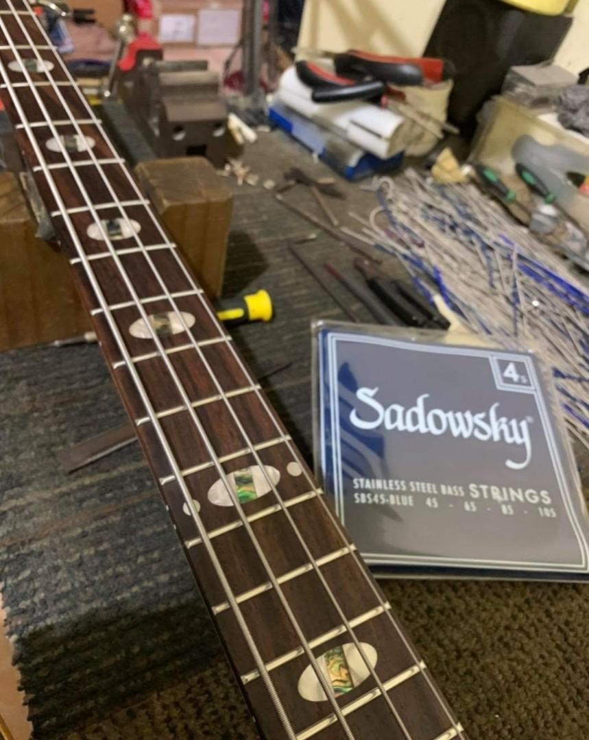 SQOE BS100 4STRING BASS (Category: Musical Instruments) located in Taguig. Submitted by jmwilloffire1 (Listing ID 1066037904, Image 2). Description: SQOE BS100 4STRINGS BASS -NEVER USED IN GIG -NO MAJ DENTS/SCRATCHES -TUNED UP/LOW ACTION -STRINGS UPGRADED TO SADOWSKI COD/MEETP UP ONLY BASS ONLY NOTHIN MORE INCLUDED..