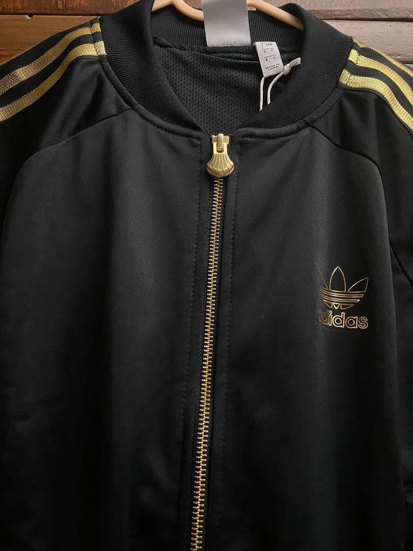 Black and Gold Adidas Track 2.0, Women's Fashion, Coats, Jackets and on Carousell