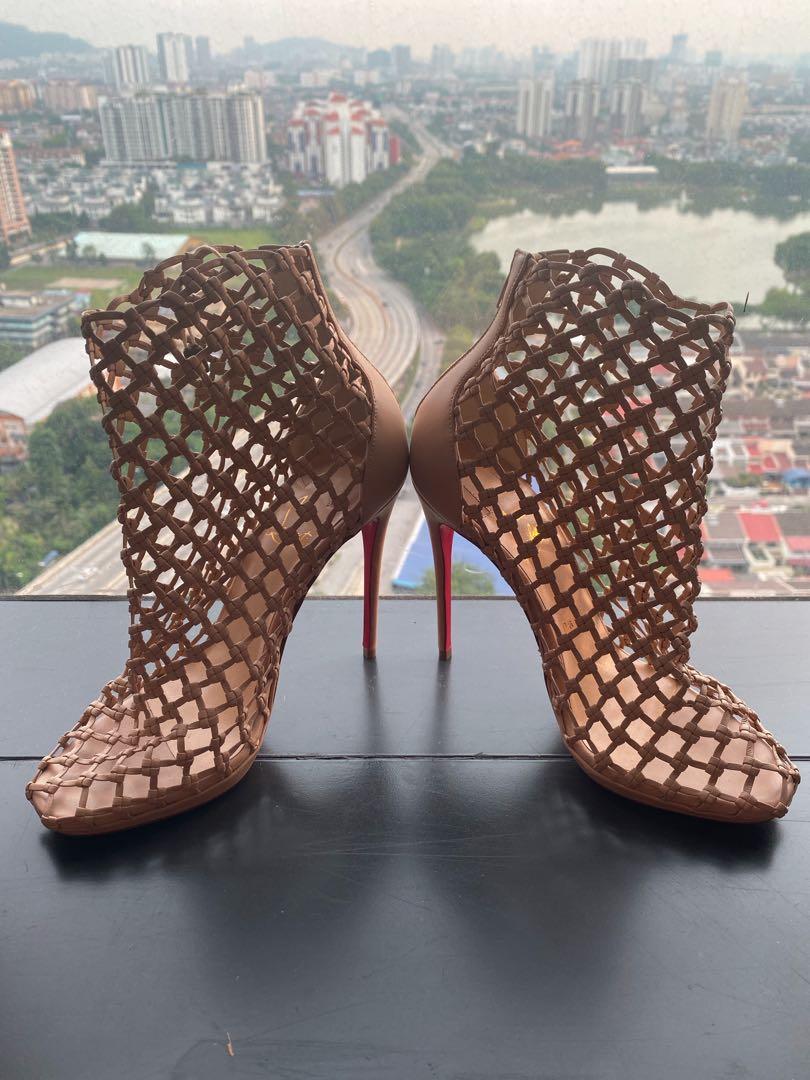 Christian louboutin boot shop