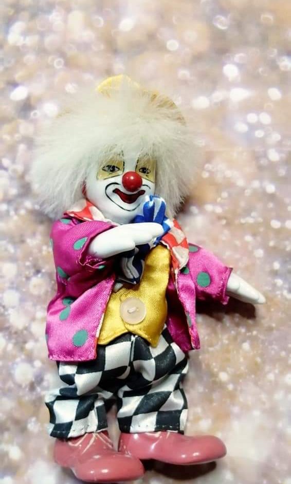 Porcelain face clown dolls clearance